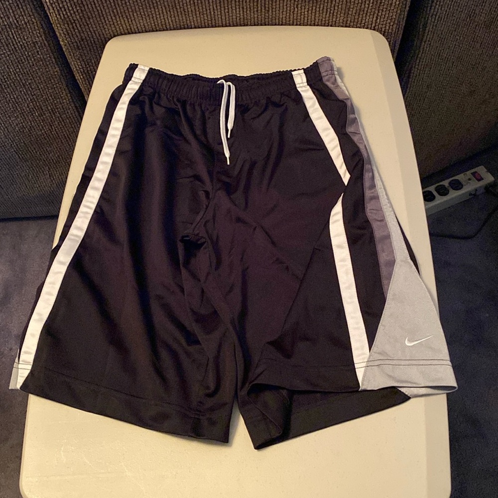 Nike Basketball shorts (No pockets). Color: Black/Gray/White. Size: Kids L.